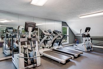 Fitness Center with Large Floor to Ceiling Mirrors